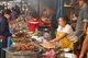 Laos: Barbecued meat vendor at the Morning market, Luang Prabang